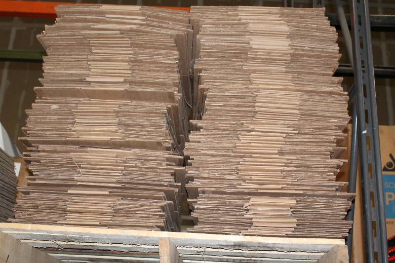 lot 204 image: Pallet Lot of (app. 300) Cardboard Puck Boxes.
