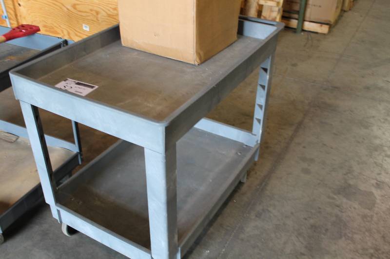 lot 52 image: Plastic Cart wWheels & Lower Shelf Handle 40 x 26 x 32.