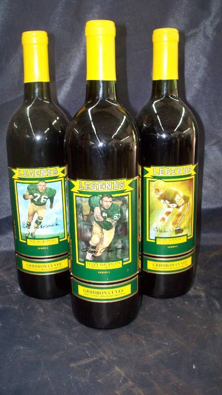 lot 37 image: Collectible Wine Bottles Packers