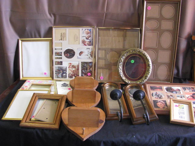 lot of frames and candle holders see photos