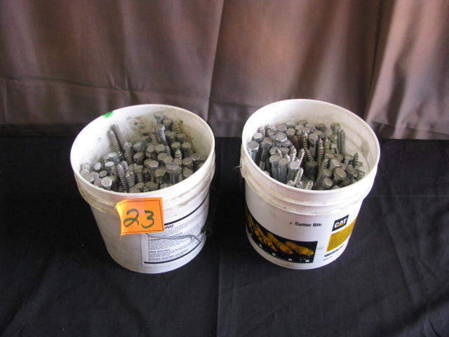 two buckets of lag screws look to be two sizes 4 and 6