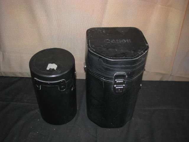 two vintage cannon lense cases intact