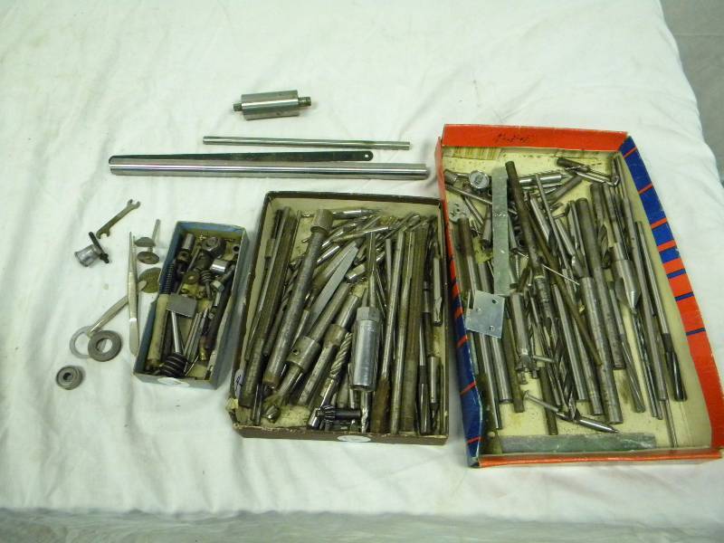 lot 29 image: Drill bits, tools, and parts