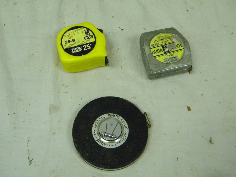 lot 98 image: Tape measures