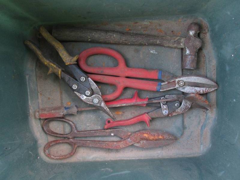 lot 34 image: Plastic tote filled with cutters, h...