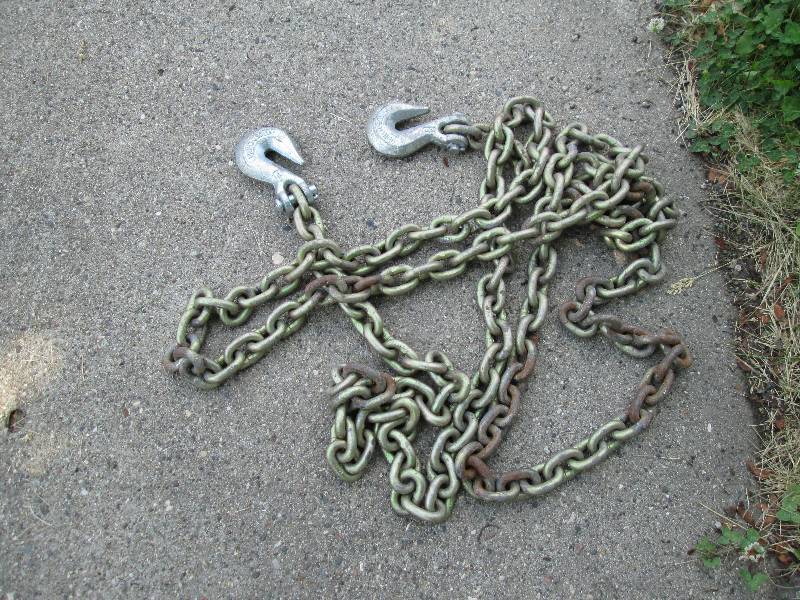 lot 35 image: Heavy chain with hook ends...
