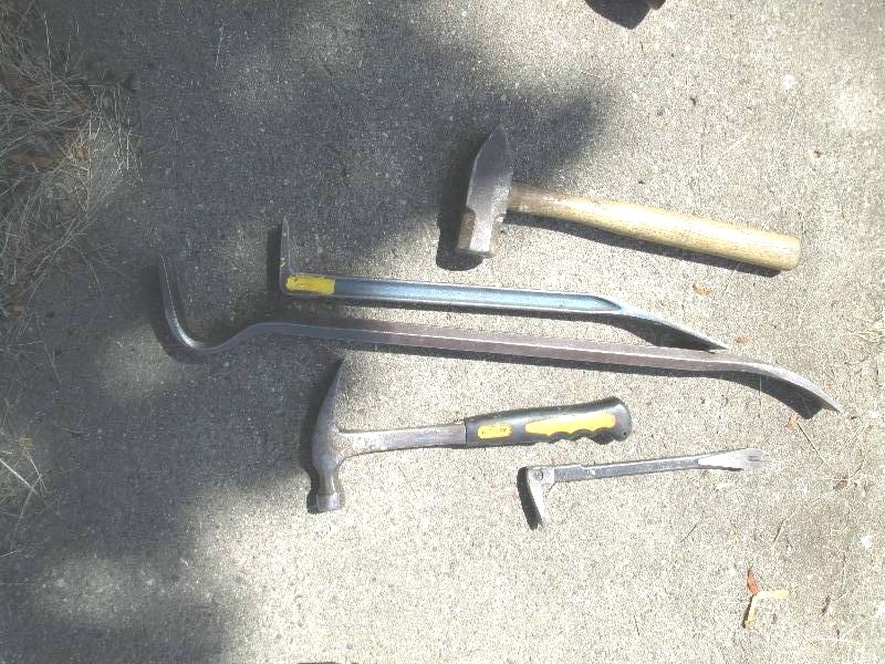 lot 44 image: Hammer and pry bar...