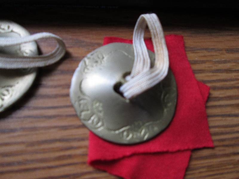 lot 62 image: Finger Cymbals...