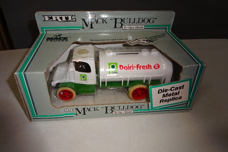 lot 12 image: Ertl 1937 Ford Tractor Tank Bank Publix Dairy Fresh