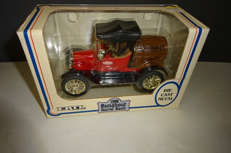 lot 32 image: Ertl 1918 Runabout Barrel Bank True Value