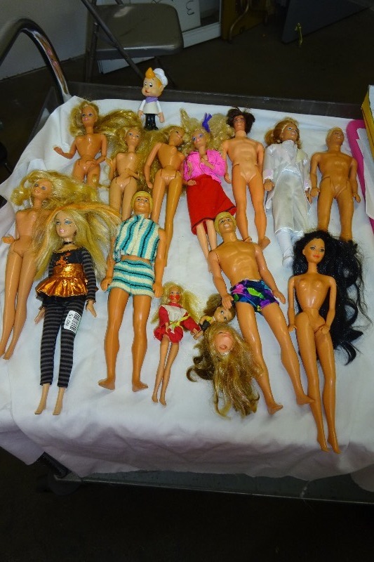 lot 96 image: Barbie and ken dolls