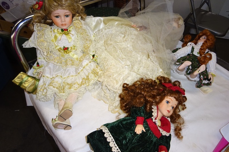 lot 97 image: 4 ceramic dolls
