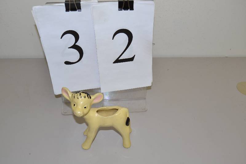 lot 32 image: Vintage calf planter