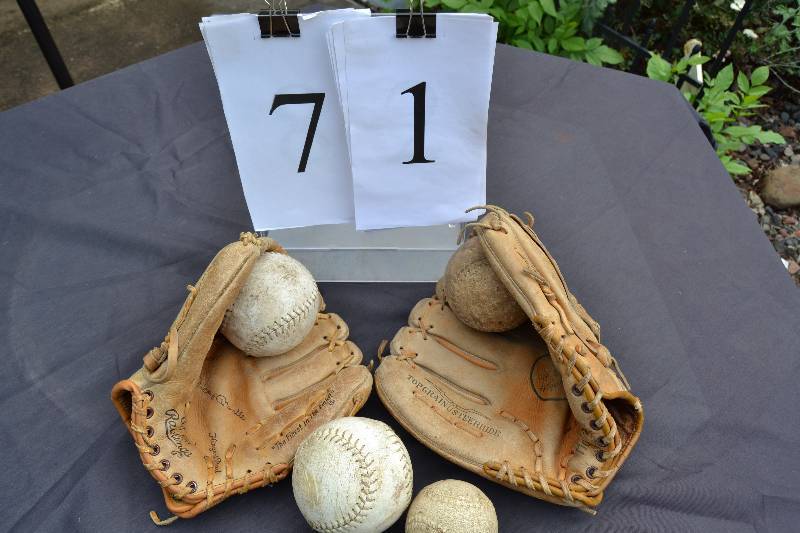lot 71 image: Baseball gloves, balls