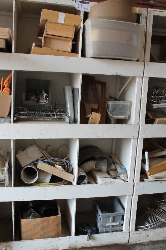 lot 24 image: Conent of Shelves (8) Including Metal Grates Plastic Bins wMetal Bolts PVC Adapter And More.