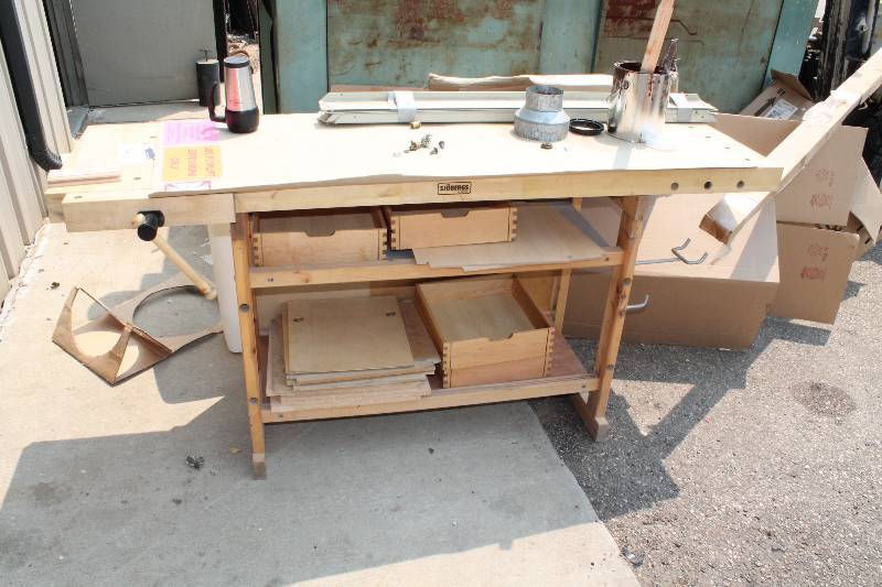lot 54 image: Custom Wooden Work Bench wWork Top & 2 Lower Shelves Includes Contents Metal Hardware Coffee Mug And More.