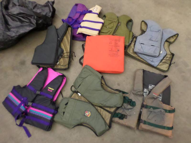 lot 150 image: Bag Full Of Misc Life Vests ...