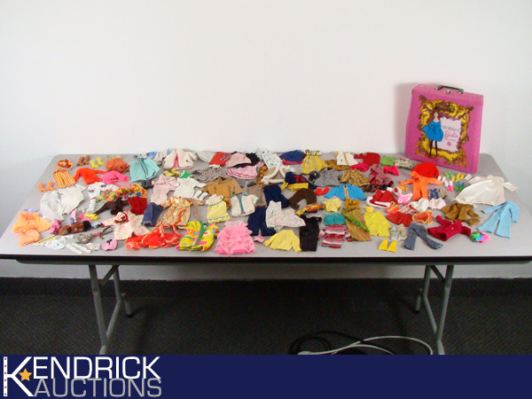 lot 41 image: Large Lot of Vintage 1960s BarbieKenFrancie Doll Clothing, and Accessories