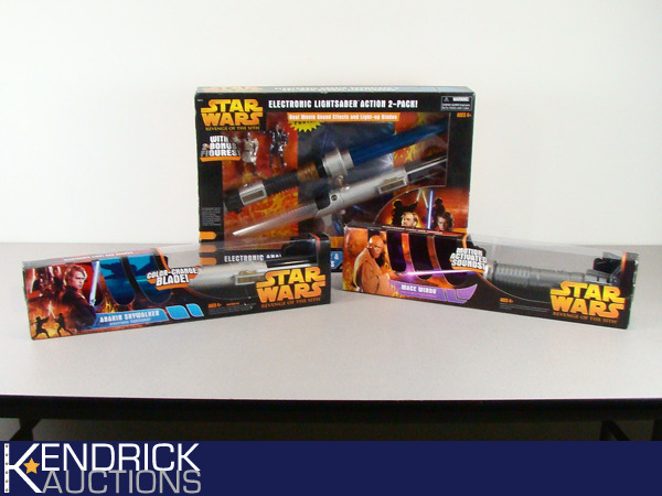 lot 44 image: Lot of 4 New Mint in Box Star Wars Lightsabers