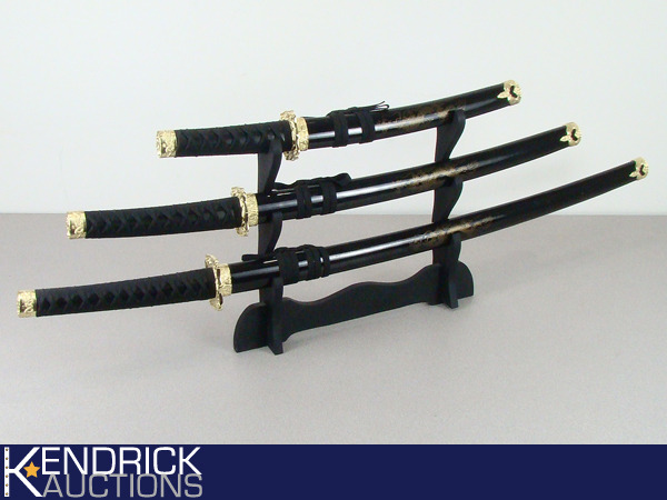 lot 63 image: 3 Asian Swords with Display Shelf