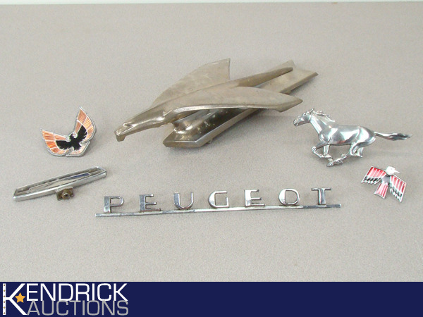 lot 73 image: Lot of Collectible Vintage Car Ornaments and Emblems