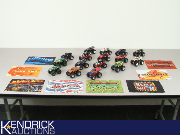 lot 97 image: 16 - 164 Scale Hot Wheels Monster Trucks with 8 Flags