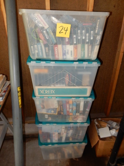 lot 24 image: About 300 VHS Tapes..  Approx 60 per bin.. Bin included