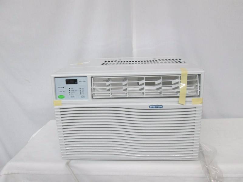 lot 28 image: Norpole 6,050 Btu Window Air Conditioner w Remote