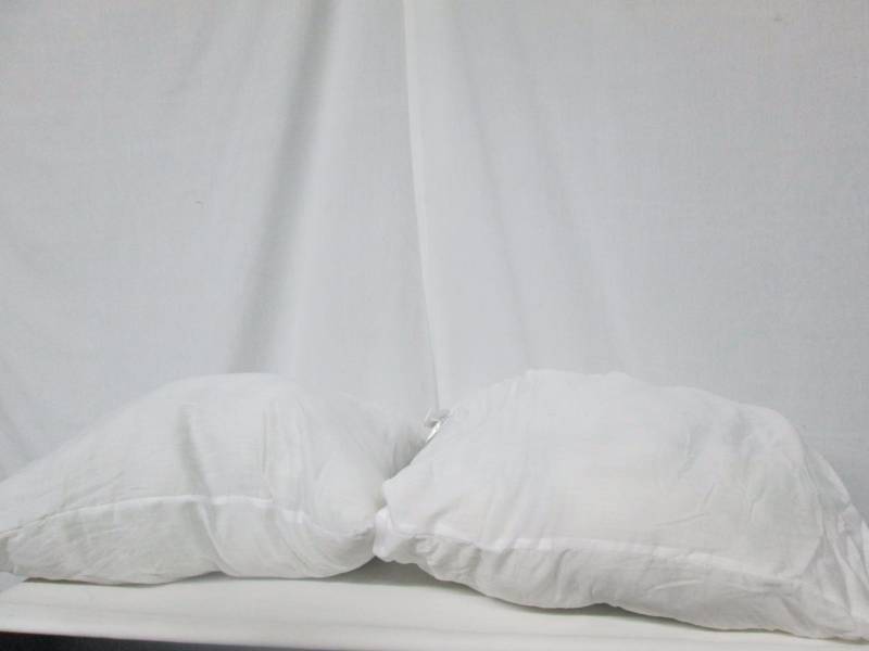 lot 91 image: Pair Rolled Standard Pillows