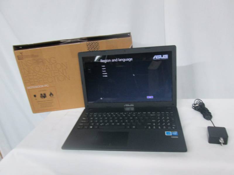 lot 4 image: ASUS 15.6 4GB Windows 8.1 Laptop
