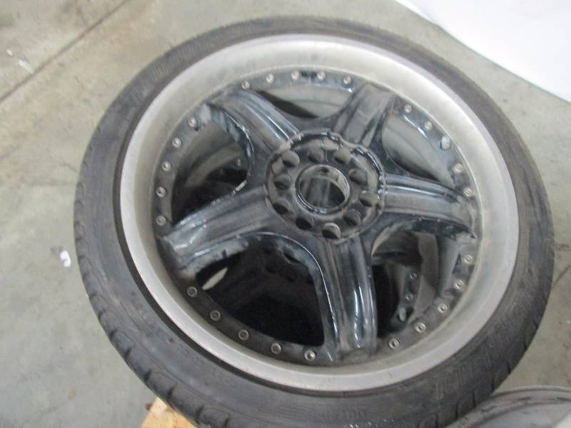 lot 42 image: Four - 17 Black Rims and Tires