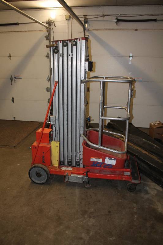 lot 6 image: Skyjack Model Scissor Lift I25 Capacity 350lbs Capacity 12V 25ft. Platform Height 2600PSI Lift Pressure180Bar.