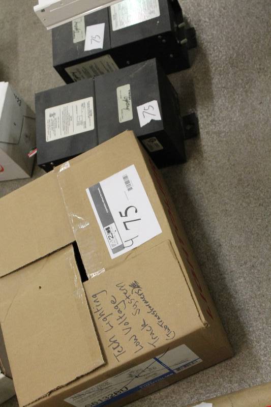 lot 75 image: Box Lot of (4) Including Tech Lighting Low Voltage Track System 48 Long Clear Nickel Hardware Low Voltage Lighting Transformer And More.
