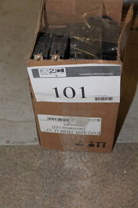 lot 101 image: Box of General Electric Circuit Breakers.