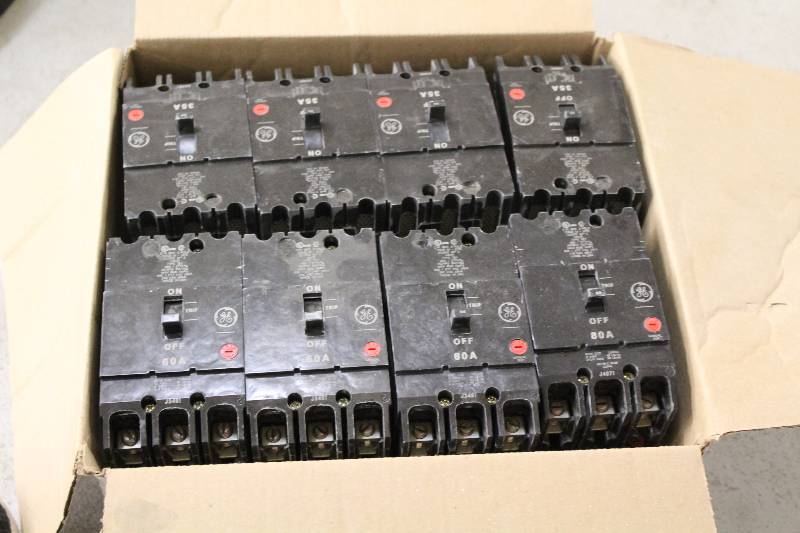 lot 97 image: Box of General Electric 60A Circuit Breakers.