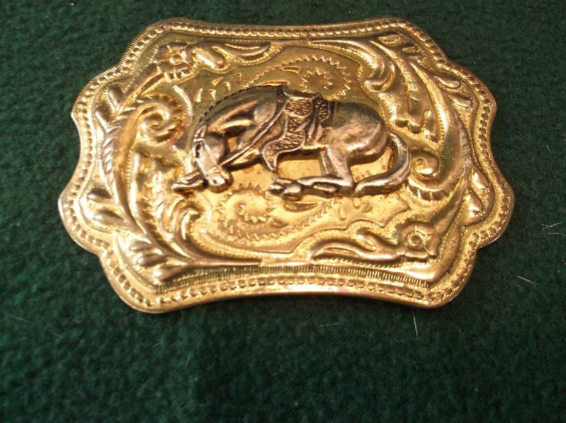 lot 95 image: Belt buckle