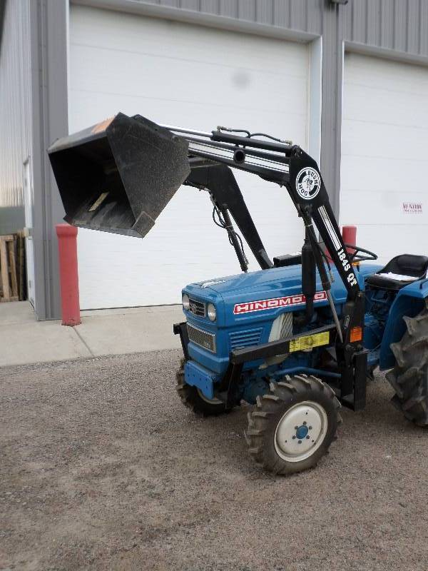 lot 1 image: Hinomoto AWD Tractor With BushHog 1...