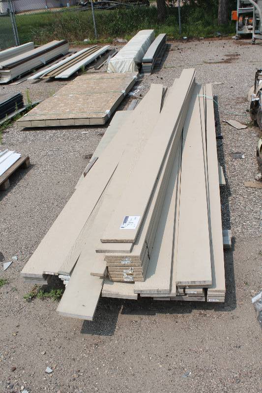 lot 71 image: Lot of Miscellaneous Exterior Siding 3-8 x 16 1 Width app. 40 ct.