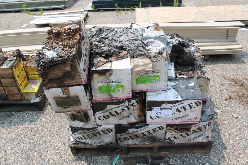 lot 82 image: Pallet Lot of Nail Rolls For Siding & More Boxes Have Smoke Damage.