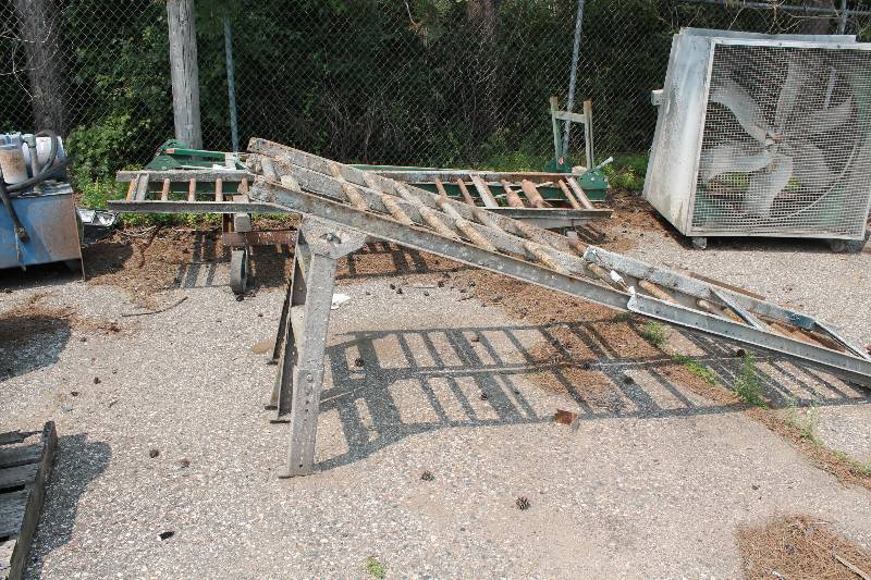 lot 95 image: Lot of (4) Conveyor Belt Tracks Metal wWheels 24 x 10 (11) 19 x 10 (3) Includes Cart.