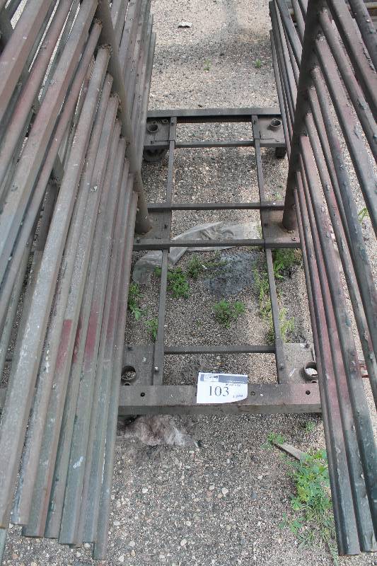 lot 103 image: Small Metal Racking Units wWheels Pole Shelves On Both Sides For SidingTubing Storage 24 x 85 x 90.