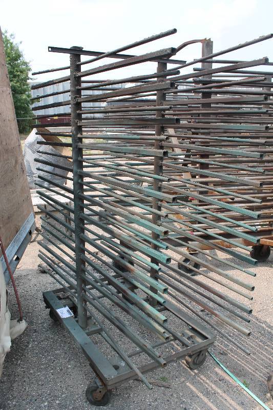 lot 110 image: Metal Racking Units wWheels Multiple Metal Pole Shelves On Both Sides 24 x 80 x 90.