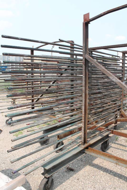 lot 106 image: Large Metal Racking Units wWheels Multiple Metal Pole Shelves On Both Sides 94 x 80 x 90.
