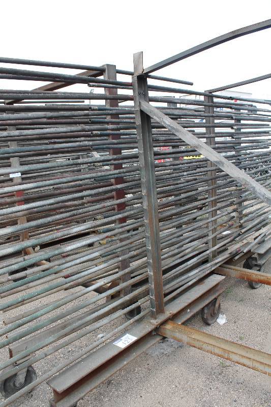 lot 123 image: Large Metal Racking Units wWheels Pole Shelves On Both Sides For SidingTubing Storage 94 x 80 x 90.