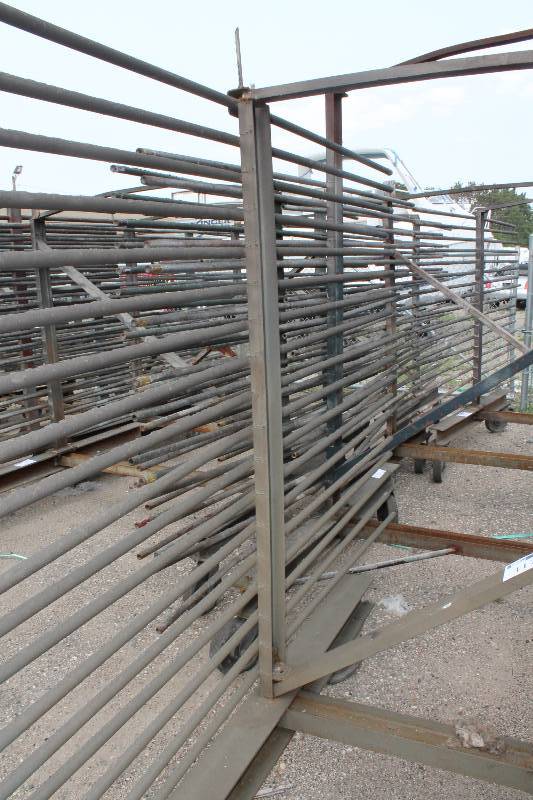 lot 117 image: Large Metal Racking Units wWheels Pole Shelves On Both Sides For SidingTubing Storage 94 x 80 x 90.