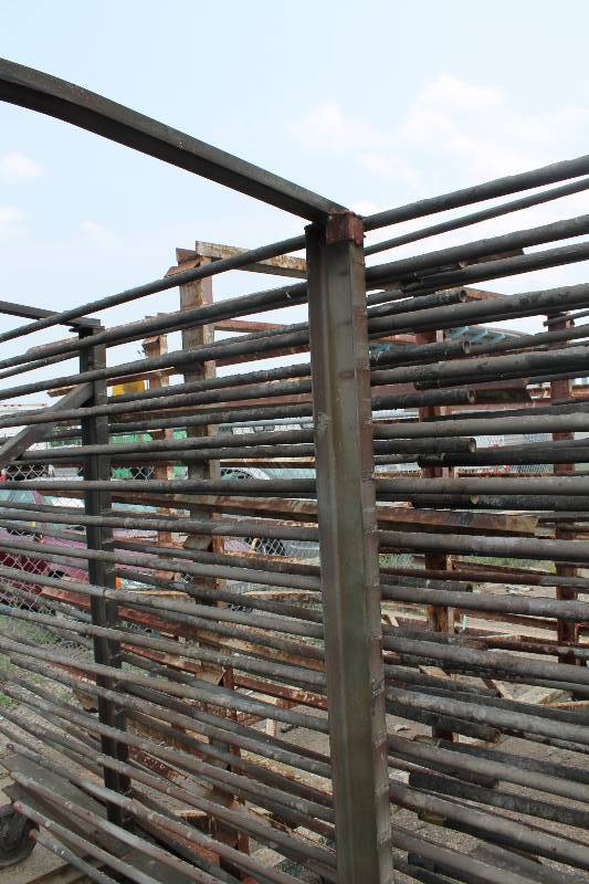 lot 119 image: Large Metal Racking Units wWheels Pole Shelves On Both Sides For SidingTubing Storage 94 x 80 x 90.