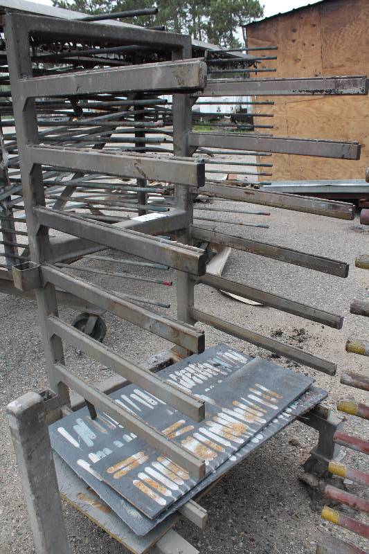 lot 126 image: Metal Racking Unit wWheels & Base Multiple Flat Bar Shelves On One Side For SidingTubing Storage 40 x 40 x 75.