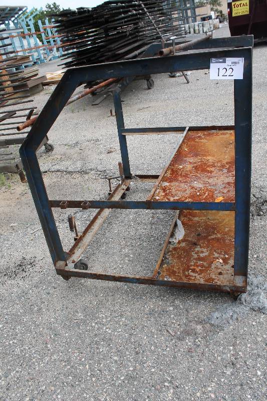 lot 122 image: Metal Shelving Unit wDual Shelves & Wheels Metal Housing 50 x 61 x 53.