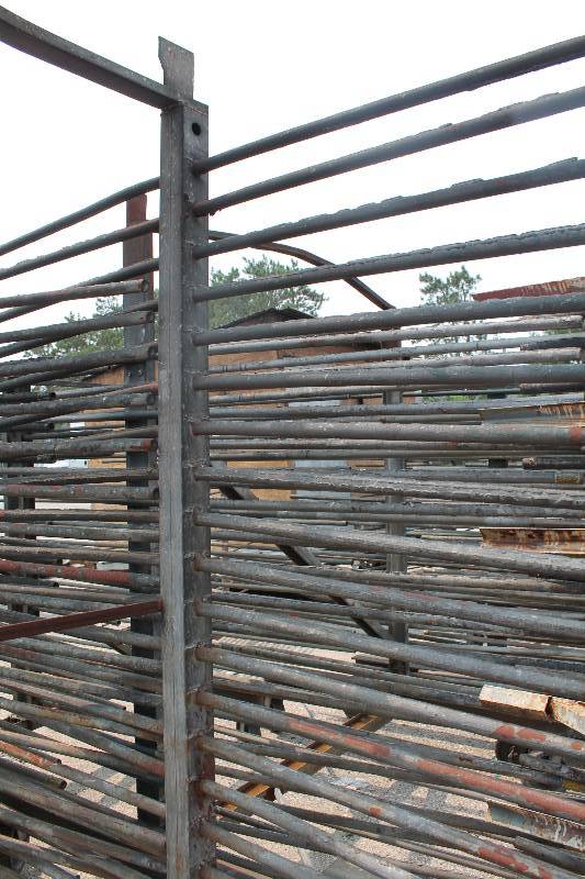 lot 130 image: Large Metal Racking Units wWheels Pole Shelves On Both Sides For SidingTubing Storage 94 x 80 x 90.