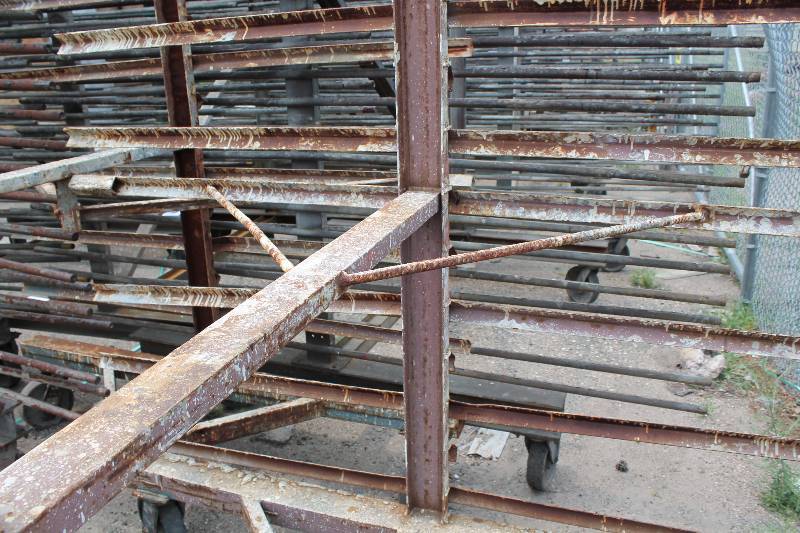 lot 132 image: Large Metal Racking Units wWheels Pole Shelves On Both Sides For SidingTubing Storage 94 x 80 x 90.
